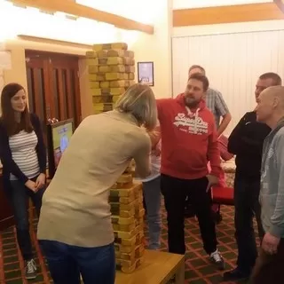 A game of giant Jenga at the Night Shelter